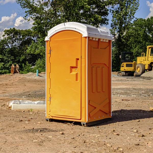 how often are the porta potties cleaned and serviced during a rental period in Bolton